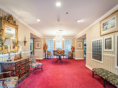 Interior hallway with seating and decorative elements