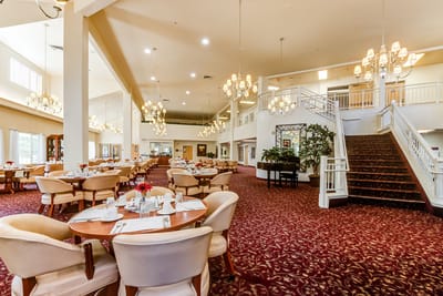 Spacious dining area with elegant decor and lighting