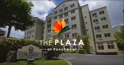Exterior view of The Plaza at Punchbowl with logo