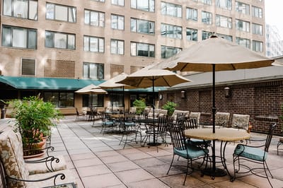 Outdoor patio area with shaded seating