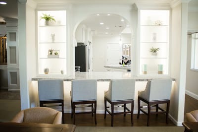 Bright and modern interior space with bar seating