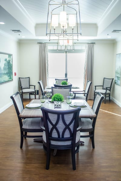 Well-decorated dining area with elegant lighting