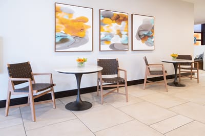 Interior lounge area with decorated walls and seating