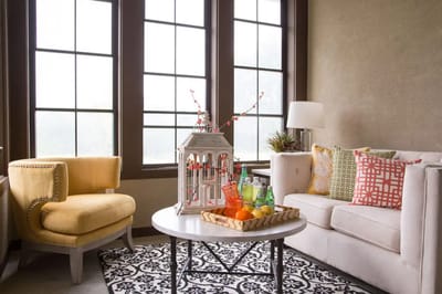 Cozy common area with large windows and comfortable seating