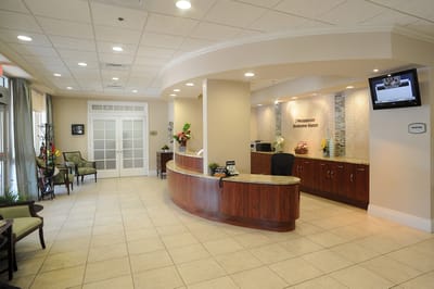 Bright reception area with seating and decor