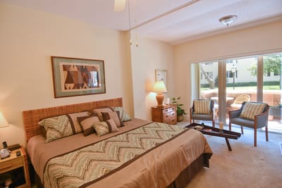 Cozy resident room with a bed and seating area