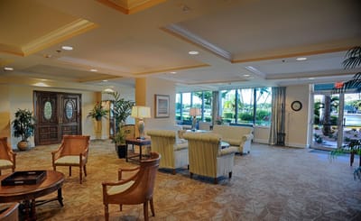 Bright common area with comfortable seating and plants