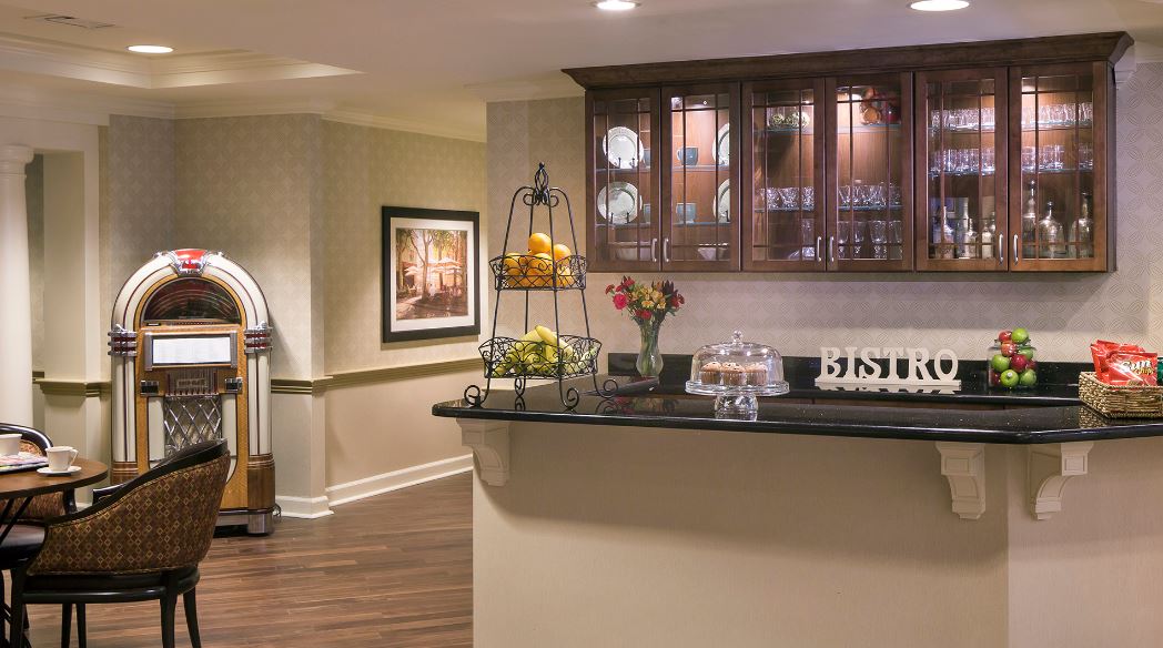 Interior view of a bistro area with food and decor