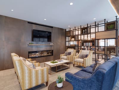 Bright common area with comfortable seating and decor