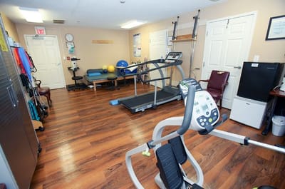 Therapy room with exercise equipment and therapy tools