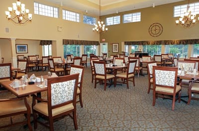 Dining room with tables set for meals