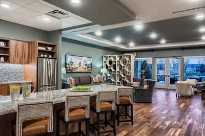 T.Boone Pickens Hospice and Palliative Care Center, hospice home in Dallas, TX — Modern common area with kitchenette and seating arrangements