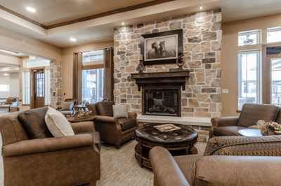 Cozy common area with seating and a fireplace