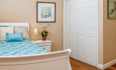 Cozy private resident room with a bed and decor