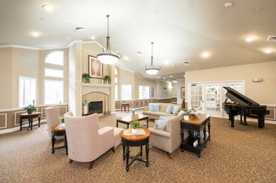 Interior common area with seating and piano