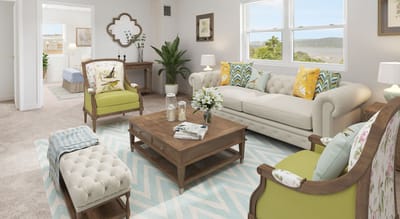 Brightly decorated common area with furniture and plants