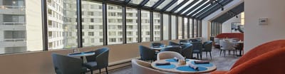 Dining area with natural light and modern decor
