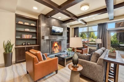 Cozy common area with a fireplace and seating