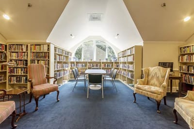 A cozy reading room filled with books