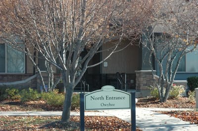 North entrance of the facility with autumn trees