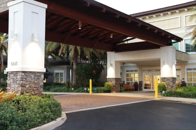 Exterior view of the facility entrance with landscaping