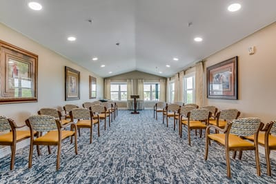 Interior view of a common area with chairs and art