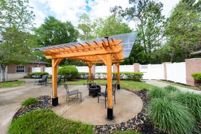Outdoor seating area with shaded pergola