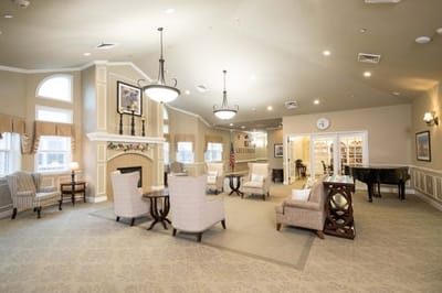 Interior common area featuring comfortable seating and piano