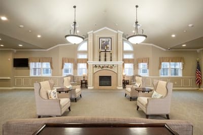 Common area with seating near a fireplace
