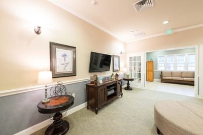 Interior common area with seating and TV