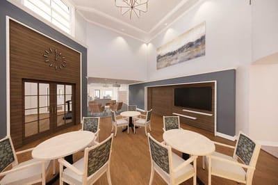 Bright common area with tables and chairs