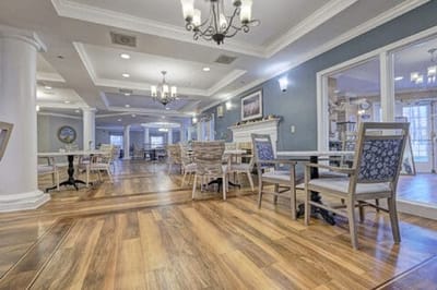 Interior view of a dining area with tables and chairs