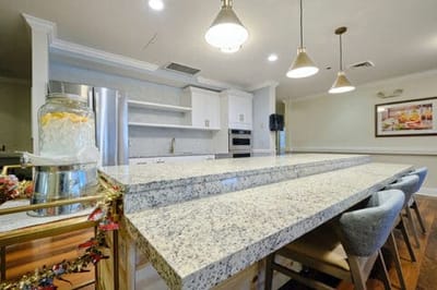 Modern kitchen space with granite countertops