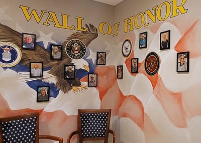 Interior view of the Wall of Honor with resident portraits