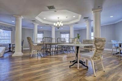 Bright common area with chairs and tables
