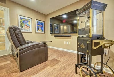 Cozy common area with recliner and popcorn machine