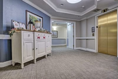 Bright corridor in a senior living facility with decor