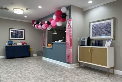 Interior lobby with decorative balloons and reception area