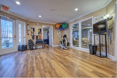 Interior view of an activity room with exercise equipment