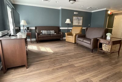 Cozy common area with seating and warm lighting