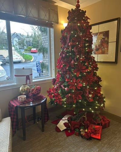 Festively decorated Christmas tree in a common area