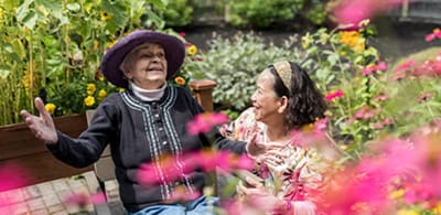 Residents enjoying time together in a garden