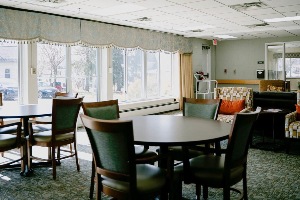 Bright common area with tables and chairs