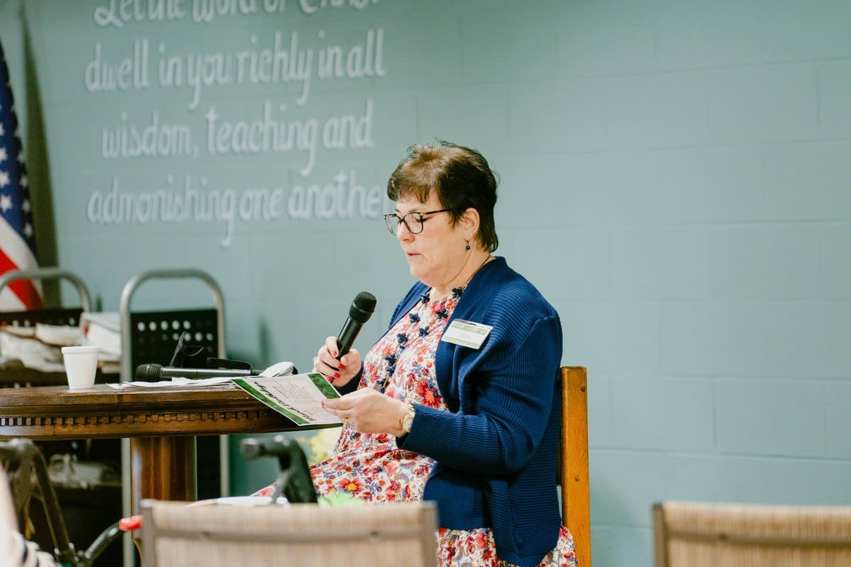 Staff member leading an activity in the facility