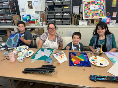 Residents and staff participating in an art activity