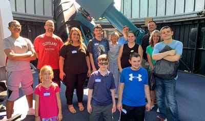Residents and staff gathered for an event indoors