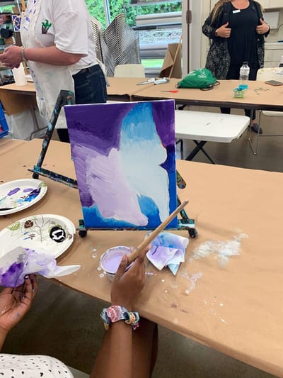 Residents engaging in a painting activity