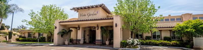 Exterior view of Vista Gardens Memory Care facility entrance