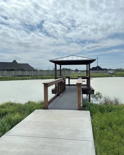 Outdoor gazebo by a pond at the facility