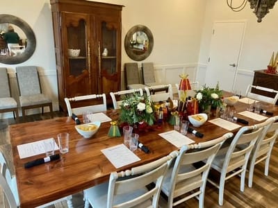 Dining area set for a special event with decorations